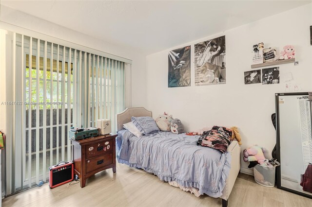 bedroom featuring light hardwood / wood-style floors