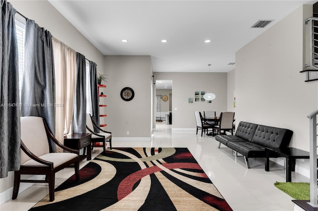 sitting room featuring light tile patterned floors