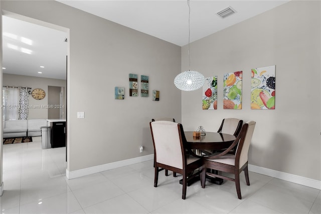 dining room with light tile patterned floors