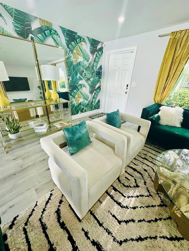 living room with wood-type flooring and a wealth of natural light