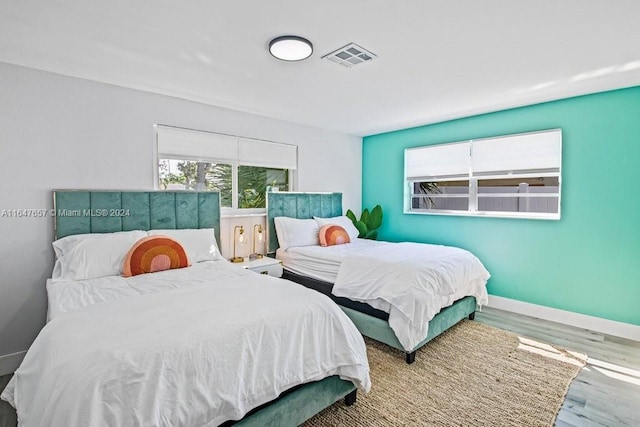 bedroom featuring hardwood / wood-style flooring