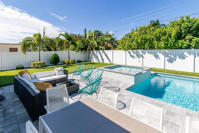 view of swimming pool with an in ground hot tub, an outdoor hangout area, and a patio area