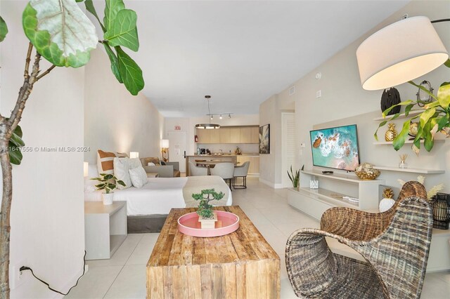 living room with light tile patterned floors