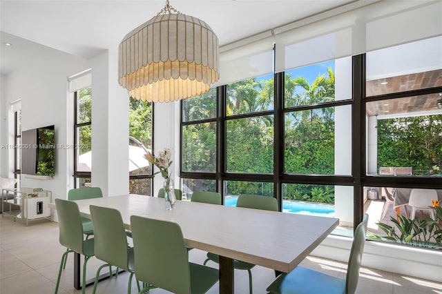 dining space with a wall of windows