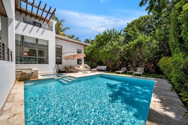 view of pool featuring a pergola, an in ground hot tub, and a patio