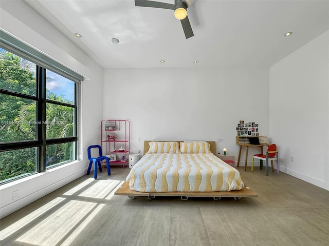 bedroom featuring recessed lighting, baseboards, and ceiling fan