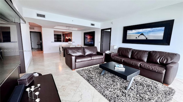 living room featuring light tile patterned floors