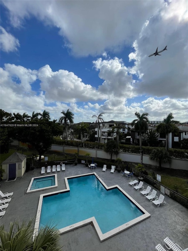 view of swimming pool featuring a patio