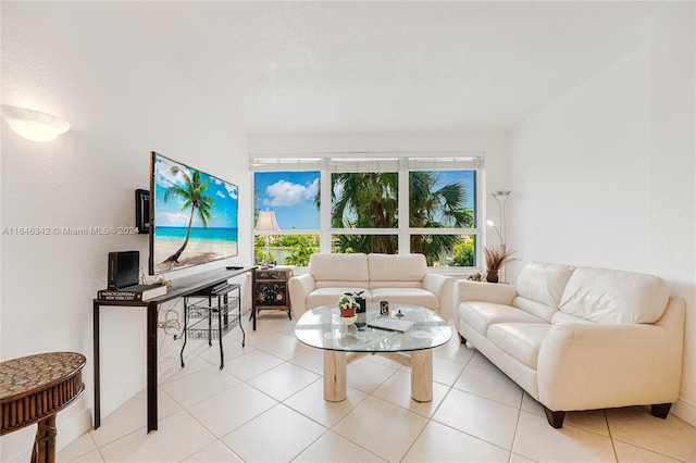 living area with light tile patterned floors