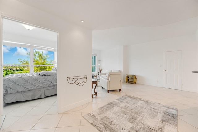 bedroom with light tile patterned flooring