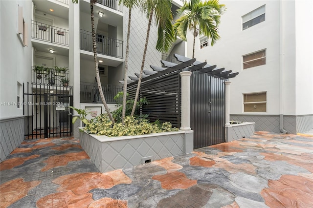 exterior space featuring a patio and a pergola