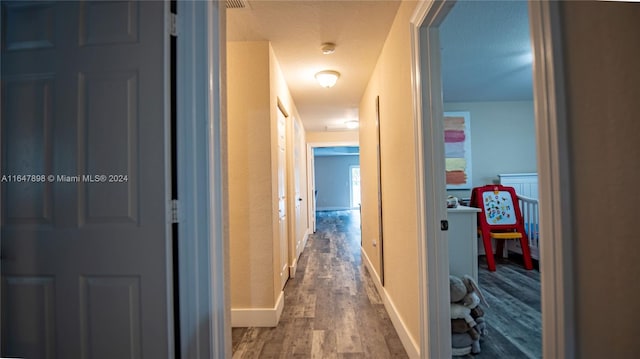 hall featuring hardwood / wood-style floors