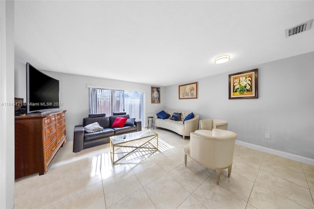 living room with light tile patterned flooring