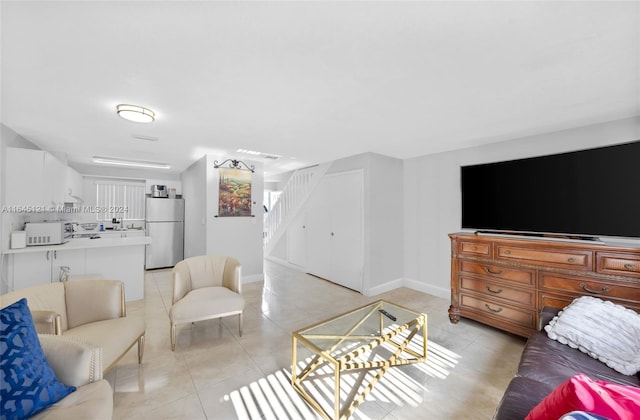 living room featuring light tile patterned floors