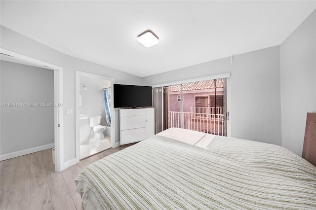 bedroom with light wood-type flooring, access to outside, and ensuite bathroom