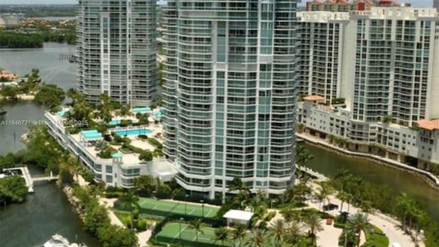 view of building exterior with a water view