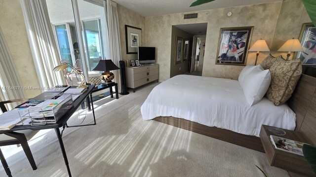 16400 Collins Ave Unit 646, Sunny Isles Beach, FL 33160 - kitchen featuring white appliances, a sink, light countertops, white cabinets, and a textured ceiling