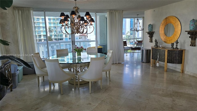 dining space with expansive windows, plenty of natural light, and a notable chandelier