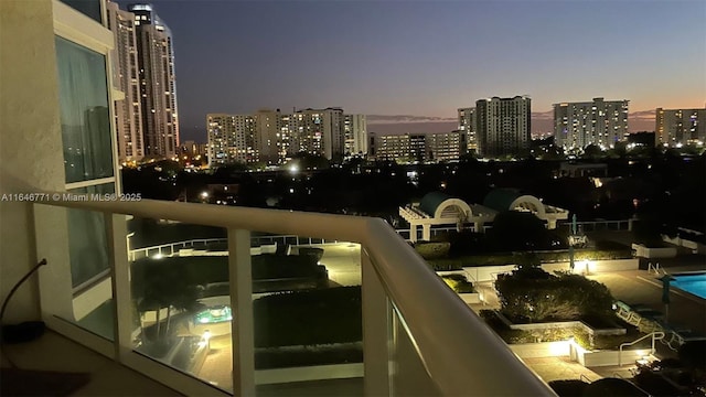 view of balcony at dusk