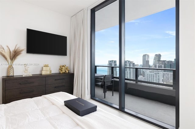 bedroom featuring expansive windows