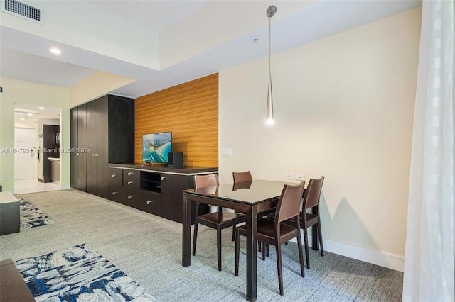 view of carpeted dining area