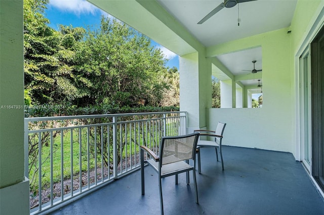 balcony featuring ceiling fan