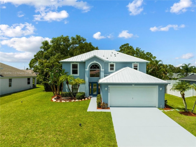 view of front facade featuring a front lawn and a garage