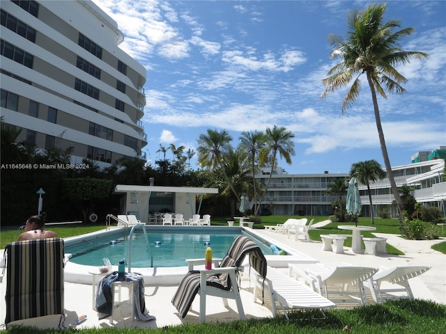 pool featuring a patio area