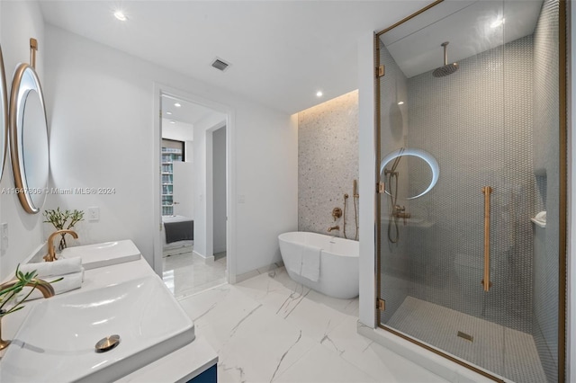 full bath featuring a walk in shower, marble finish floor, a sink, and visible vents