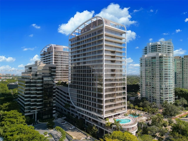 view of building exterior featuring a view of city