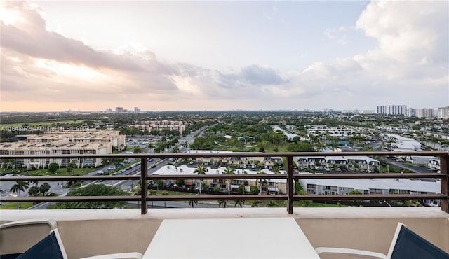 view of balcony at dusk