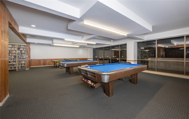 recreation room with wood walls, pool table, and dark carpet