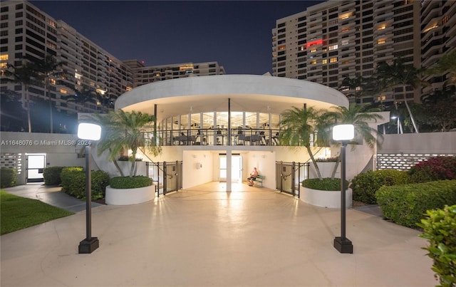 600 Three Islands Blvd Unit 1501, Hallandale Beach, FL 33009 - property at night with fence
