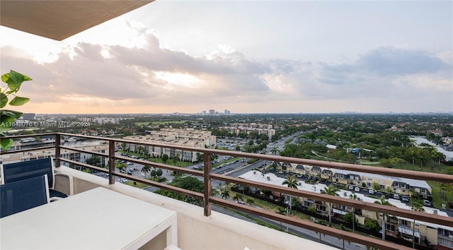 view of balcony at dusk