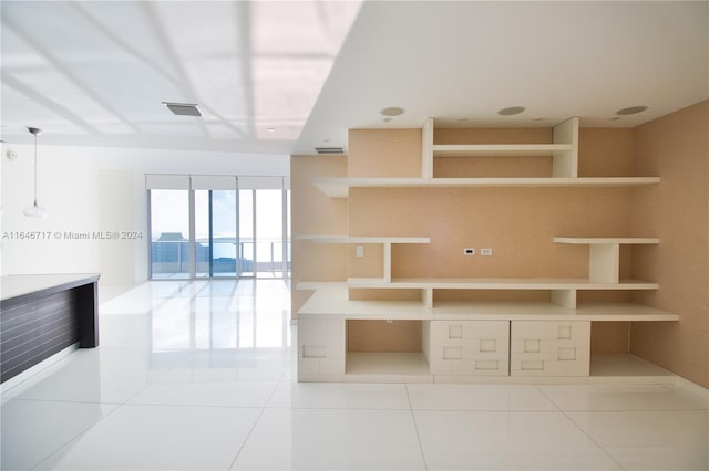 interior space featuring light tile patterned floors