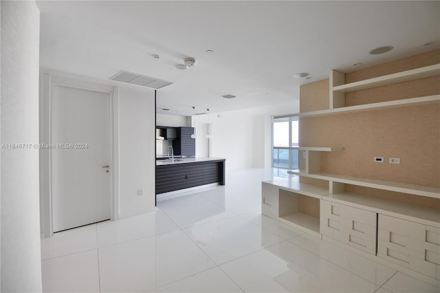 kitchen with light tile patterned floors