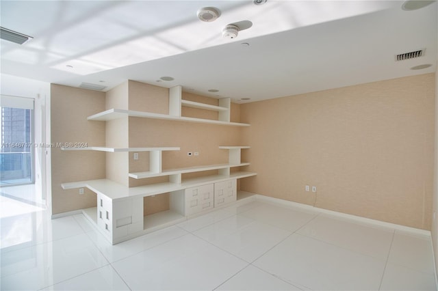 interior space featuring light tile patterned flooring