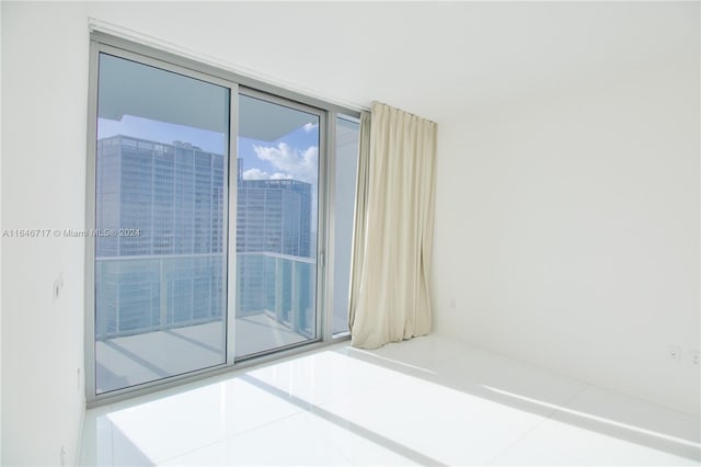 view of tiled spare room