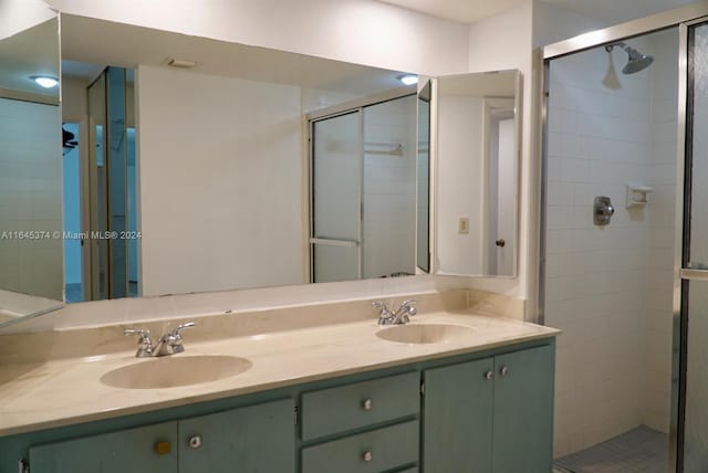 bathroom with vanity and walk in shower