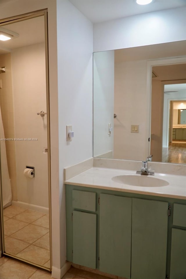 bathroom featuring tile patterned floors and vanity