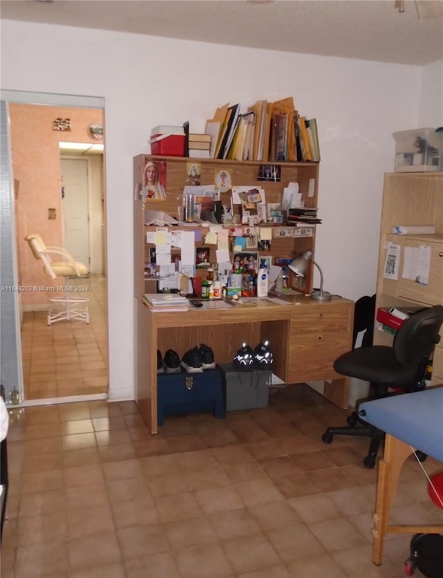 home office featuring tile patterned floors