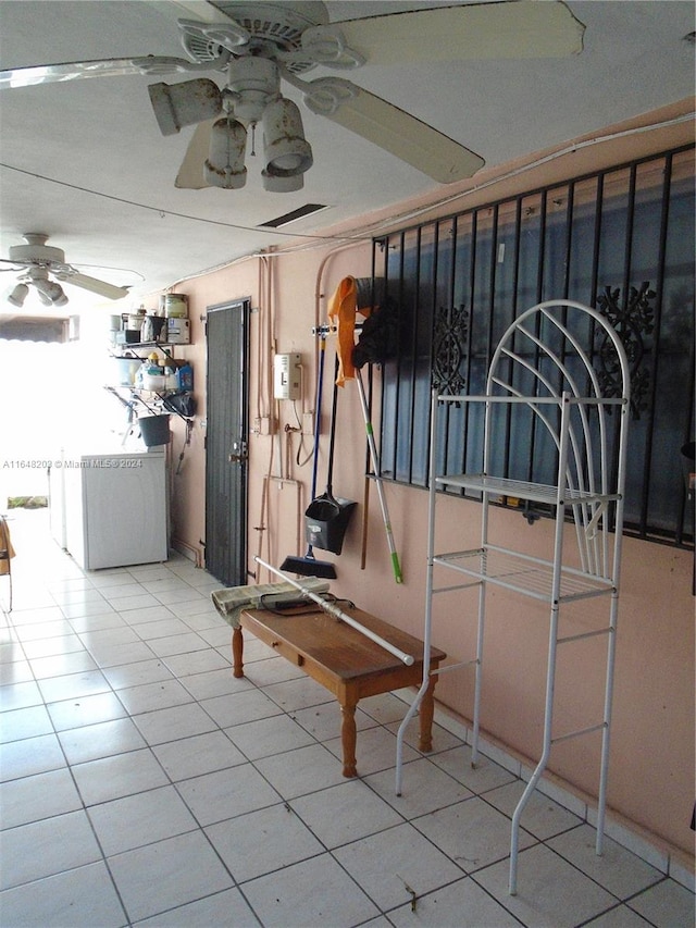 spare room featuring light wood-type flooring and ceiling fan