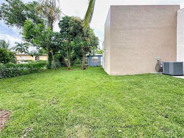 view of yard featuring central AC unit