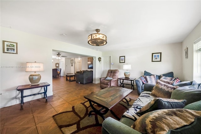 living room featuring ceiling fan