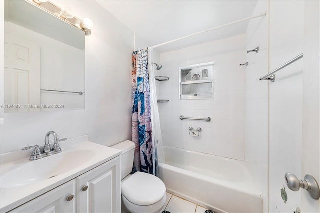 full bathroom featuring tile patterned flooring, vanity, toilet, and shower / tub combo