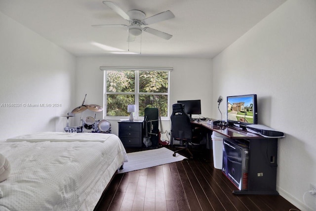 bedroom with dark wood-type flooring and ceiling fan