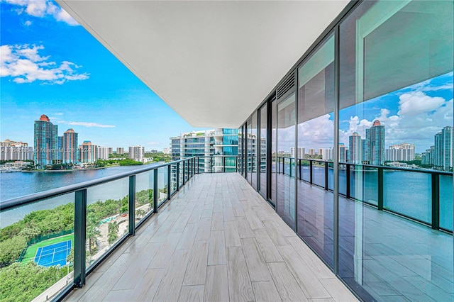 balcony featuring a water view