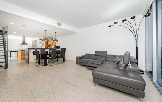 living room featuring light wood-type flooring