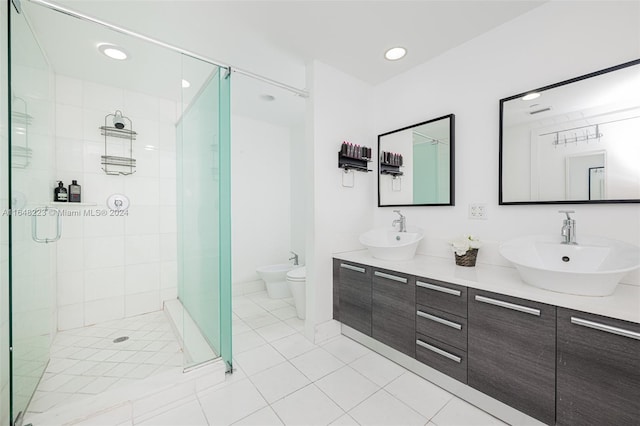 bathroom featuring a bidet, tile patterned flooring, walk in shower, and vanity