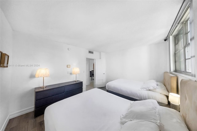 bedroom featuring hardwood / wood-style floors